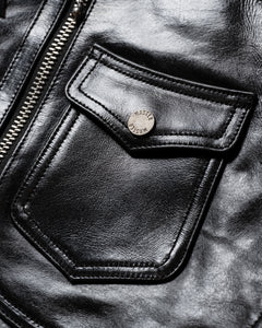 Close-up of the flap pocket on the Dawson black leather jacket.