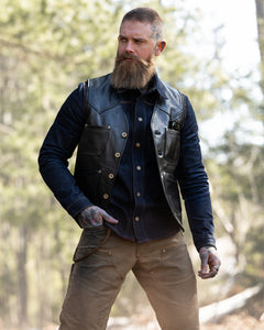 Man wearing the Journeyman Vest by Master Supply Co